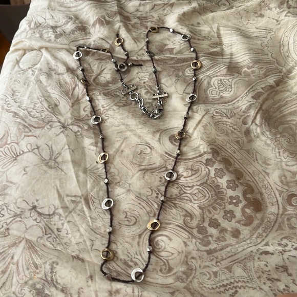 Brown chain with interesting silver beads all around. - Picture 1 of 2